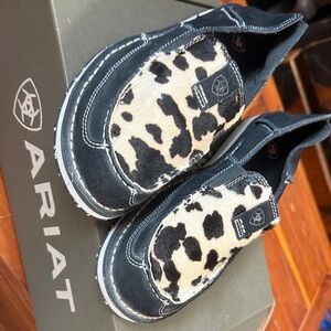 Ariat women’s Black and white cow print  and black suede cruisers size 11